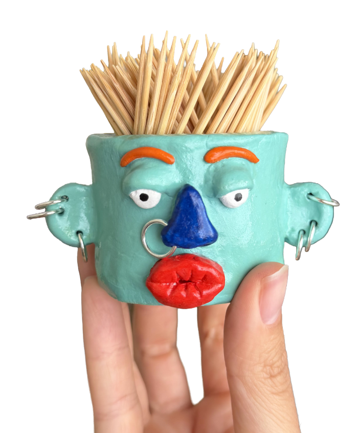 Clay face mug with toothpick hair